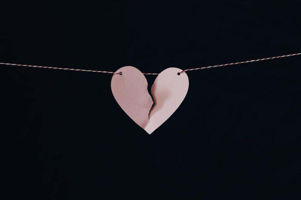 broken heart hanging on wire