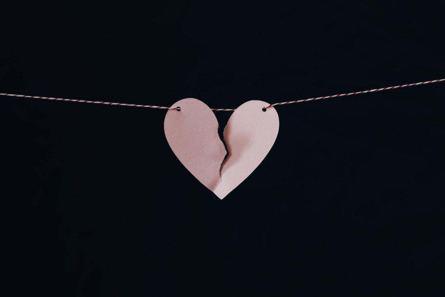 broken heart hanging on wire
