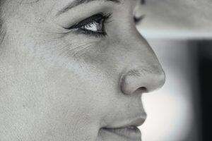 womans face in close up photography