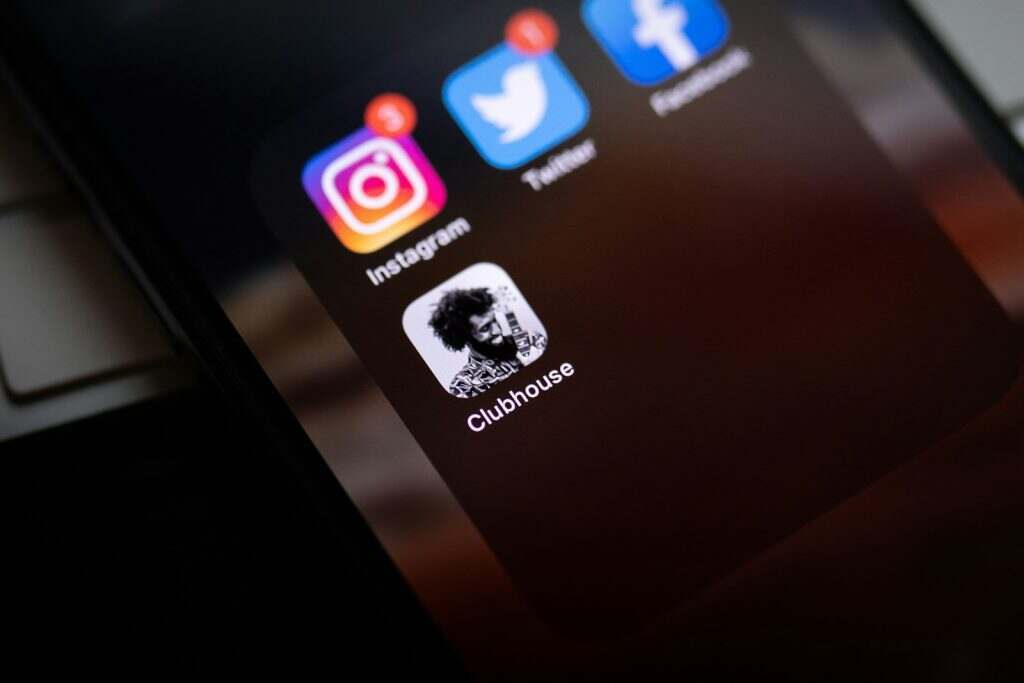 black smartphone showing icons with icons
