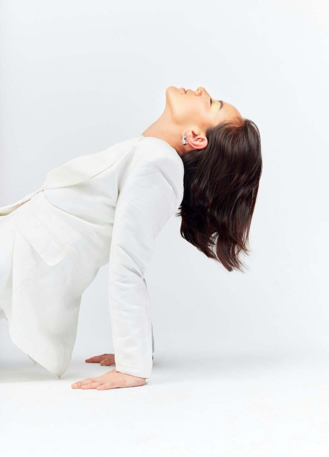 Fashion, magazine cover and a model woman in studio on a white background for trendy or classy styl