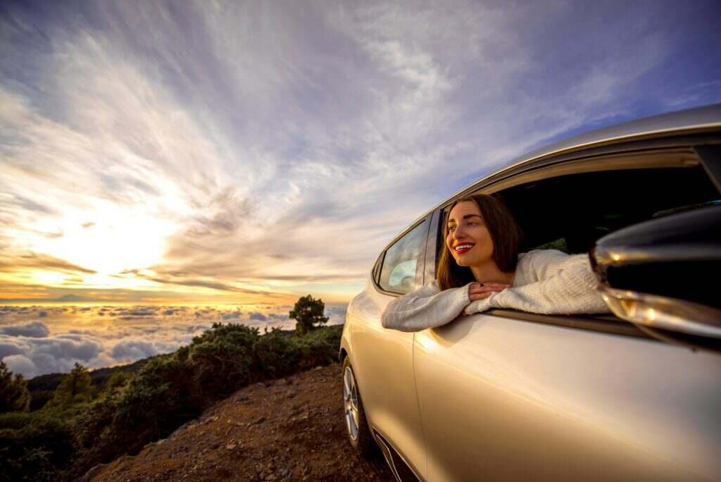 Woman traveling by car