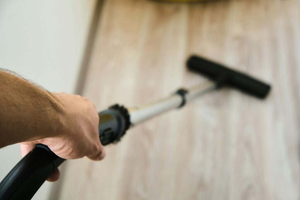 Head of modern vacuum cleaner on white. Top view.