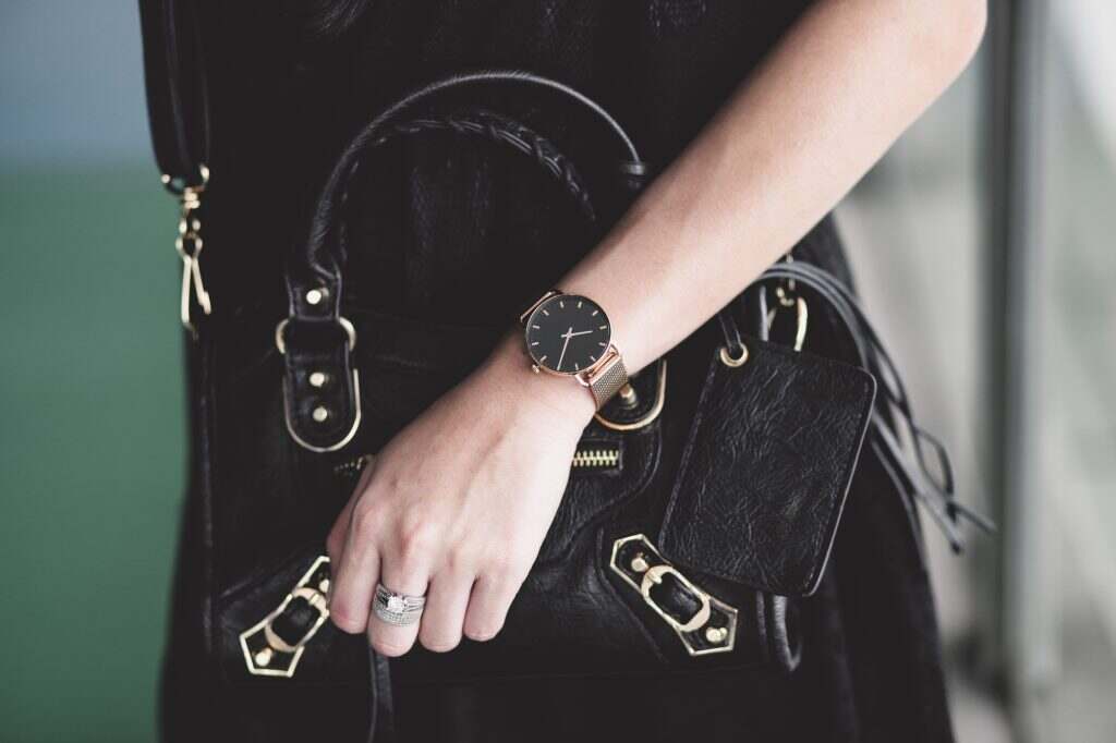 Close up of fashionable woman hand wearing jewelry