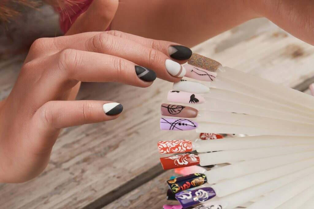 Woman choice of nail art design