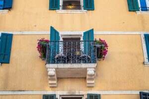 Small romantic balcony with beautiful flowers