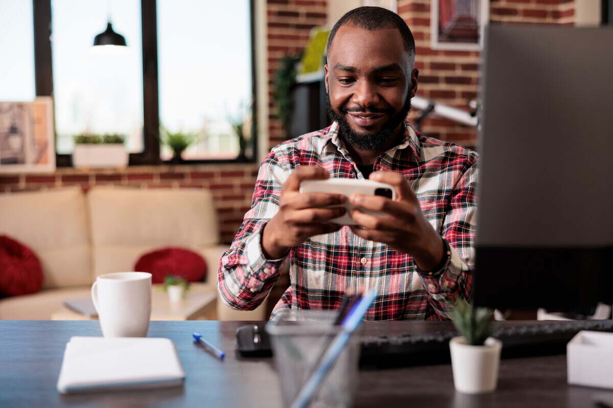 Young adult playing video games