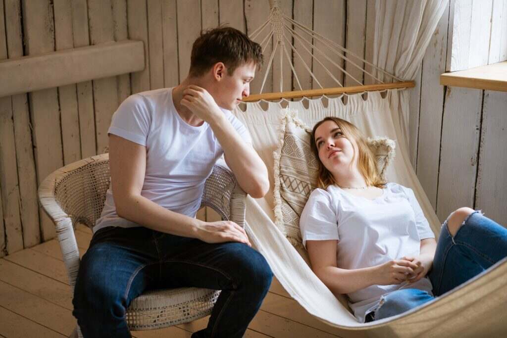 young beautiful couple in a hammock