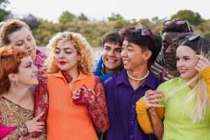 Group of young multiracial people wearing trendy retro style clothes