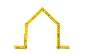 Yellow measure ruler house shape isolated on white, transparent, Construction tool