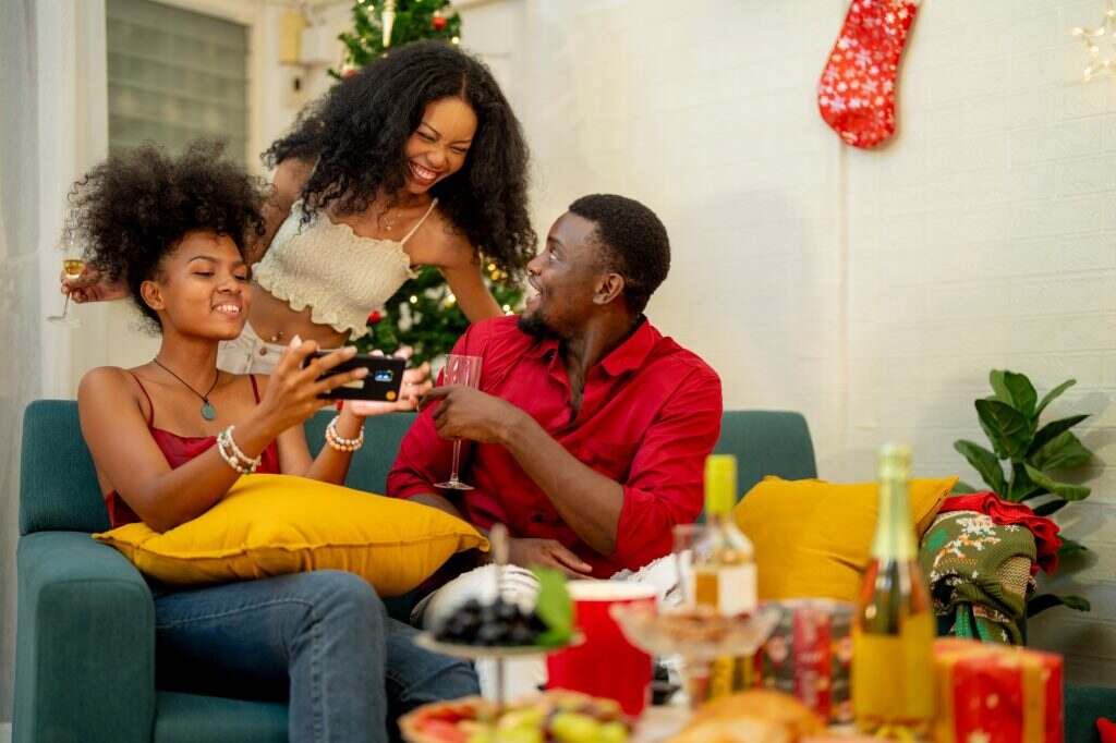 A family enjoying a cozy Christmas evening at home