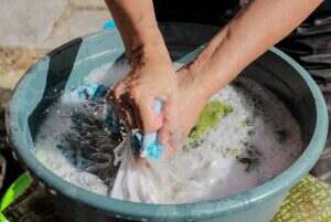 Hands washing clothes in a lungs