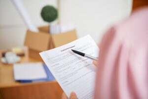 Businesswoman reading employment contract