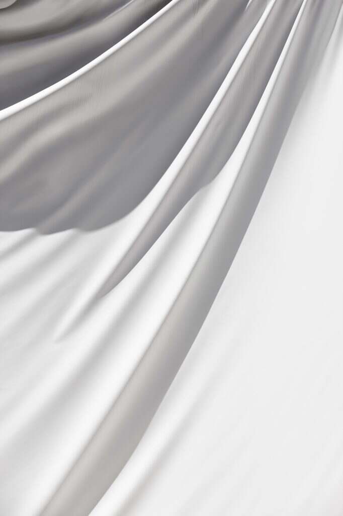 White plastic building facade outdoor cover. Copy space. Restoration works