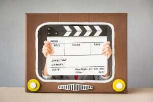 Child playing with cartoon TV