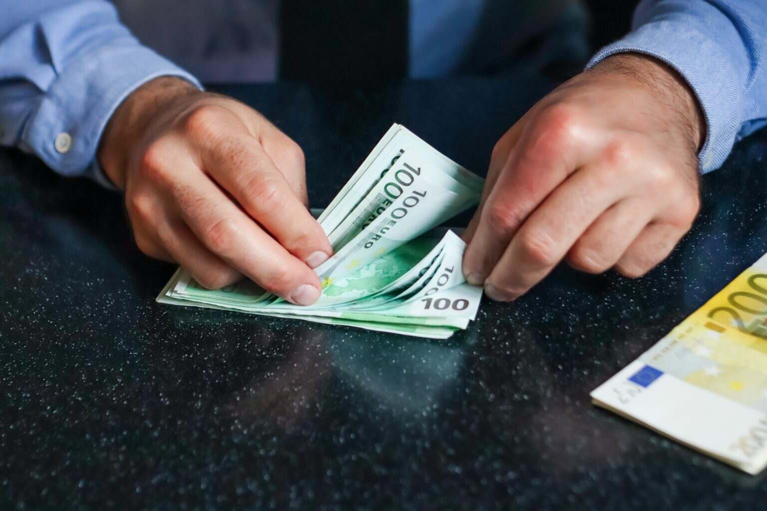 Money. Hands holding money, euro, euros, counting money, saving currency, rich,cash, hundreds,hand