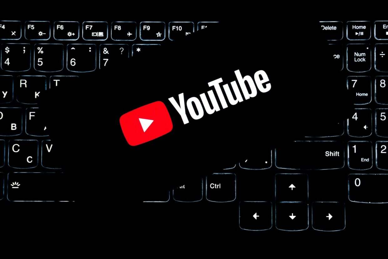 Youtube logo on a backlit keyboard.