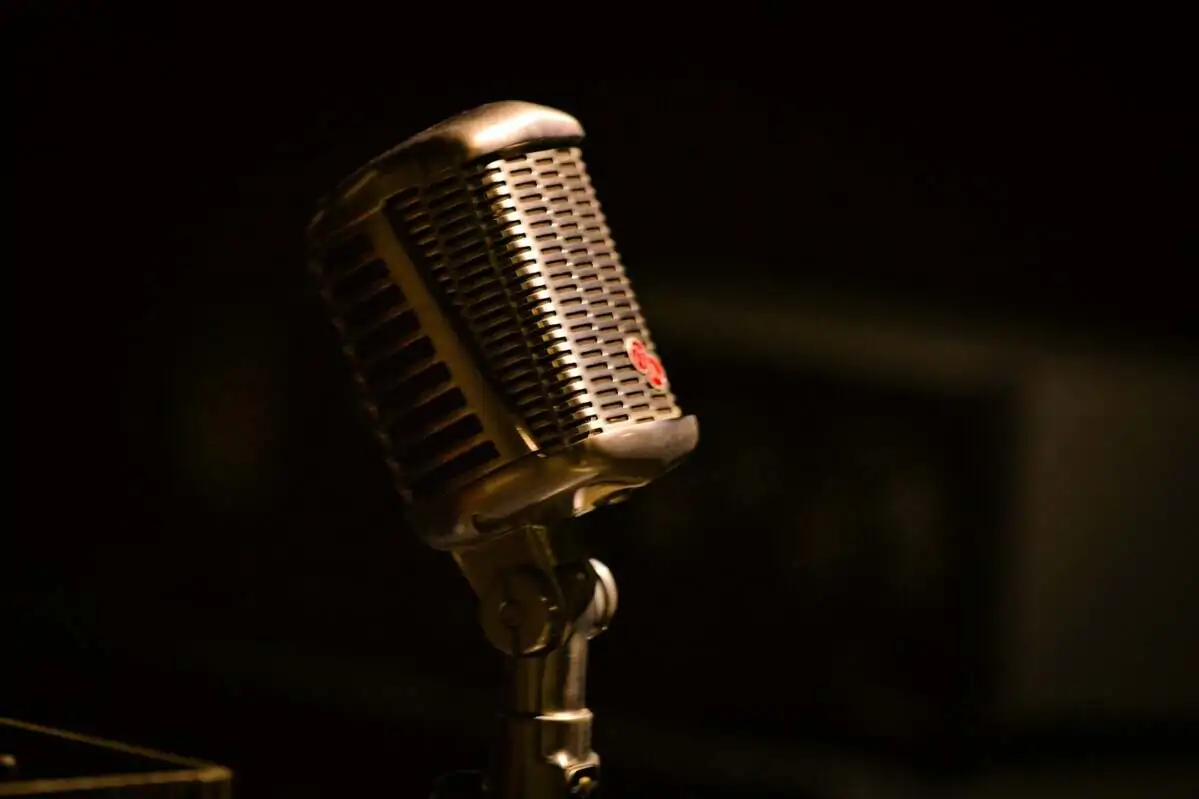 Vintage microphone on a dark background