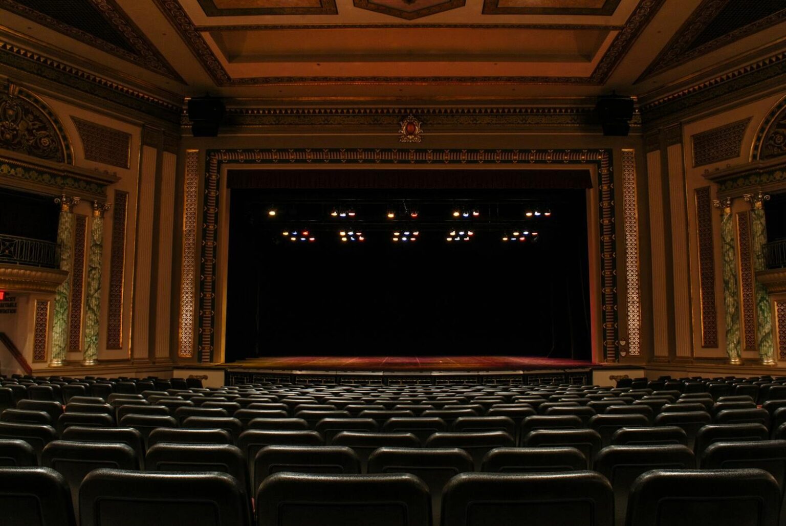 Discover the elegance of a Victorian theater in Chatham, Ontario, featuring classic architecture and empty seats.