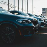 a row of cars parked in a parking lot