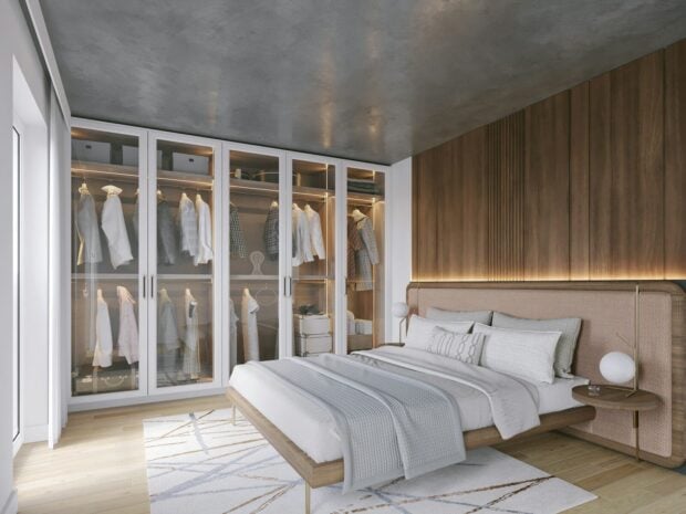 Pourquoi votre armoire déborde encore (et ce que le dressing change vraiment) a bedroom with a bed and a closet