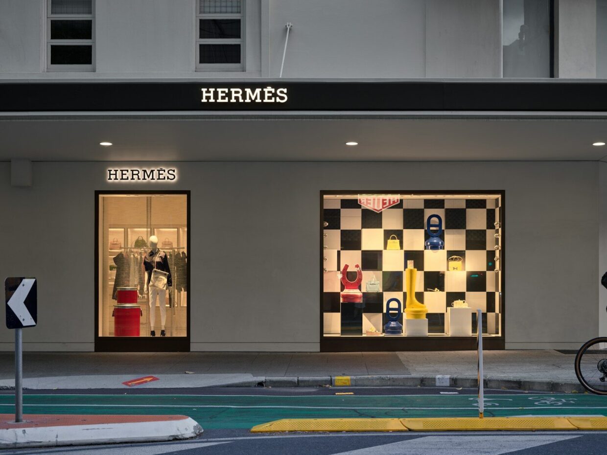 A store front with a bicycle parked in front of it